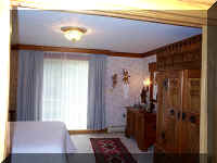 MasterBedroomThroughSlidingDoor.jpg (61431 bytes)